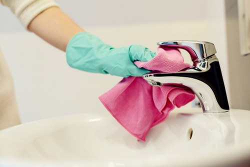 Cleaning team following safety procedures during an end of tenancy cleaning job