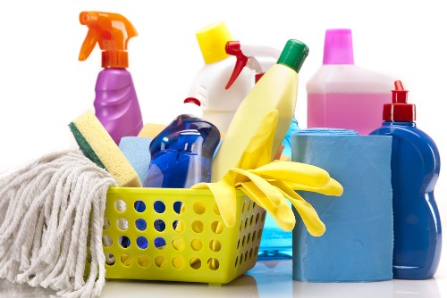 Cleaning professional using safety procedures during an end of tenancy clean