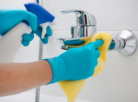 Deep cleaning a rug to help prepare a rental home for move-out inspection